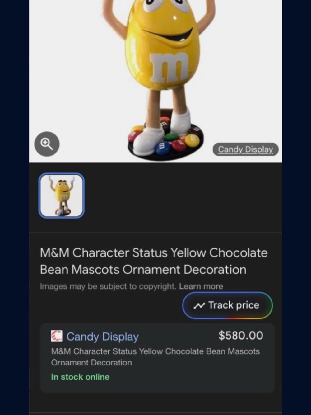 Yellow M&M Character Figurine with Candy Base